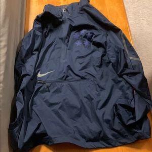 Blue Nike windbreaker